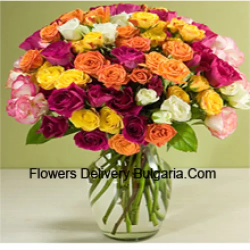 75 Mixed Colored Roses With Some Ferns In A Glass Vase