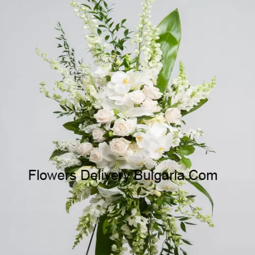 A Beautiful Sympathy Flower Arrangement That Comes With A Stand