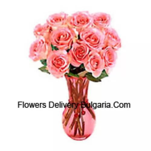 11 Roses roses roses dans un vase en verre