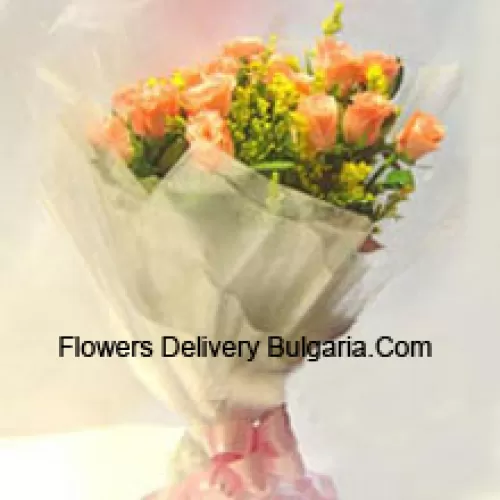 Bouquet de 11 roses oranges avec garniture saisonnière