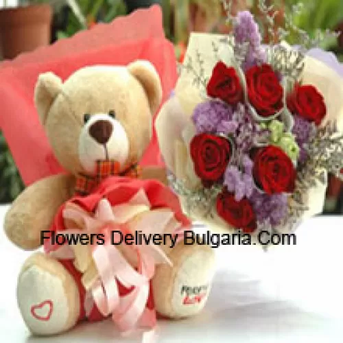Bouquet de 7 roses rouges et un mignon ours en peluche de taille moyenne