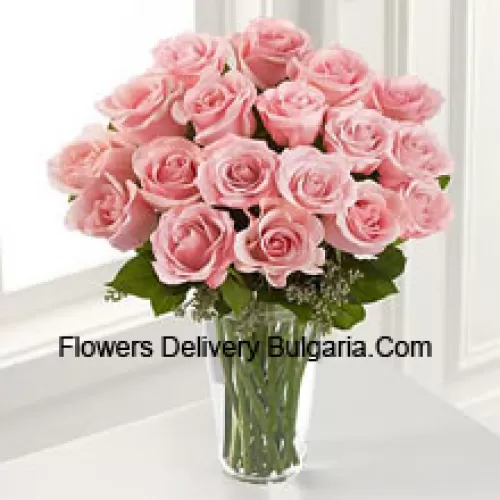 19 Pink Roses With Some Ferns In A Vase